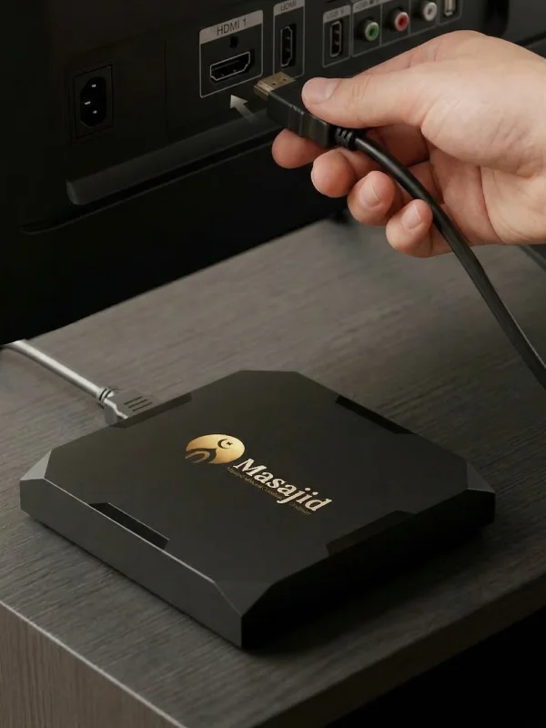 Plug MasajidBox into mosque TV — instant prayer time display